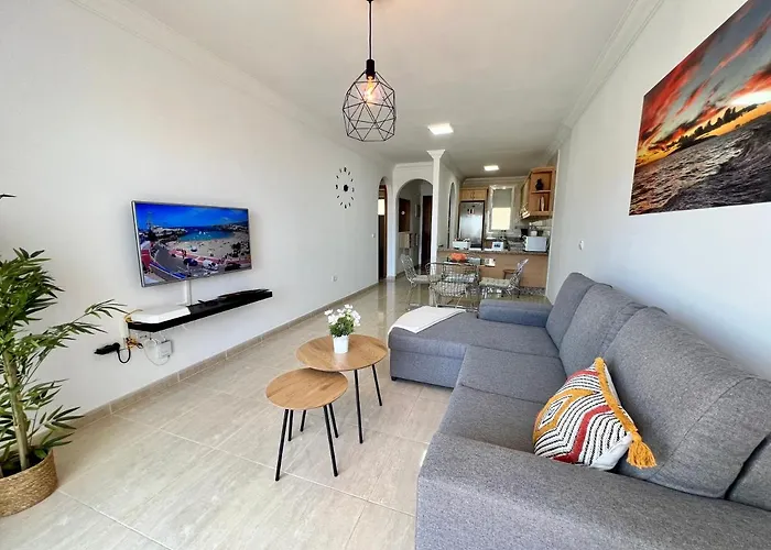 Апартаменты Sunset Sea Views And Pool